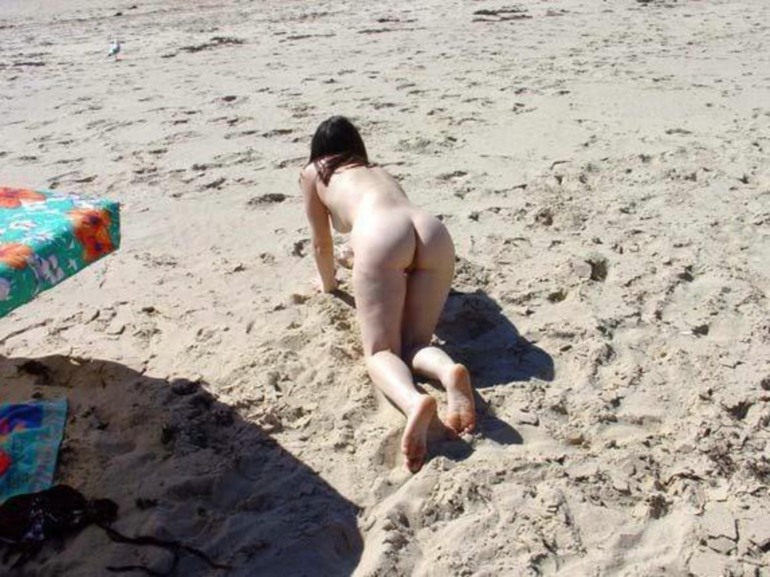 Beach photo topless woman